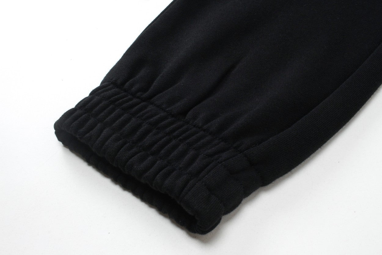 【Burberry 公式 旗艦店】24FW ラミネートロゴパンツ