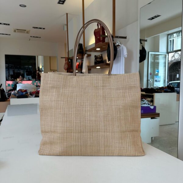 ラフィアとレザー仕上げのプラダ ギフトバッグ