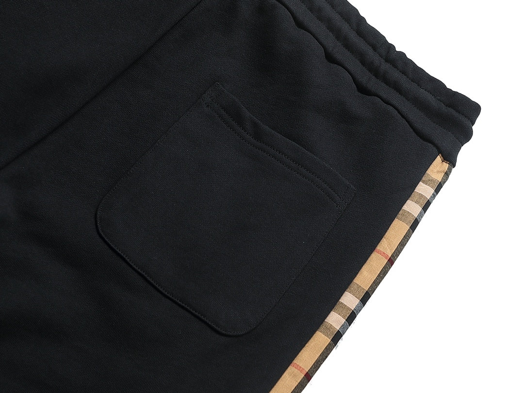【Burberry 公式 旗艦店】24FW ラミネートロゴパンツ