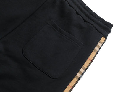 【Burberry 公式 旗艦店】24FW ラミネートロゴパンツ