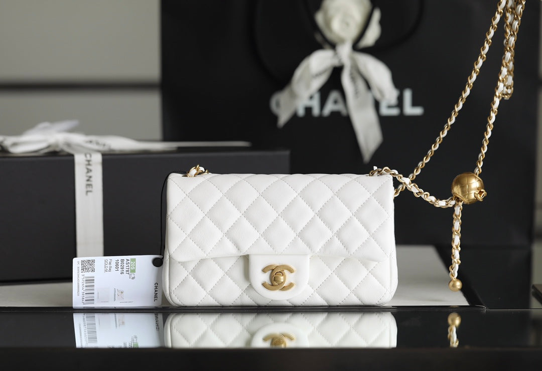 Chanel classic flap mini with golden ball