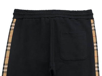 【Burberry 公式 旗艦店】24FW ラミネートロゴパンツ