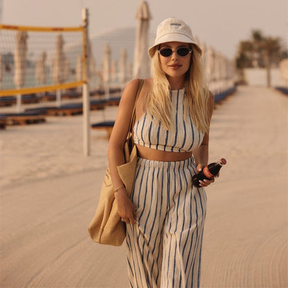 ラフィアとレザー仕上げのプラダ ギフトバッグ