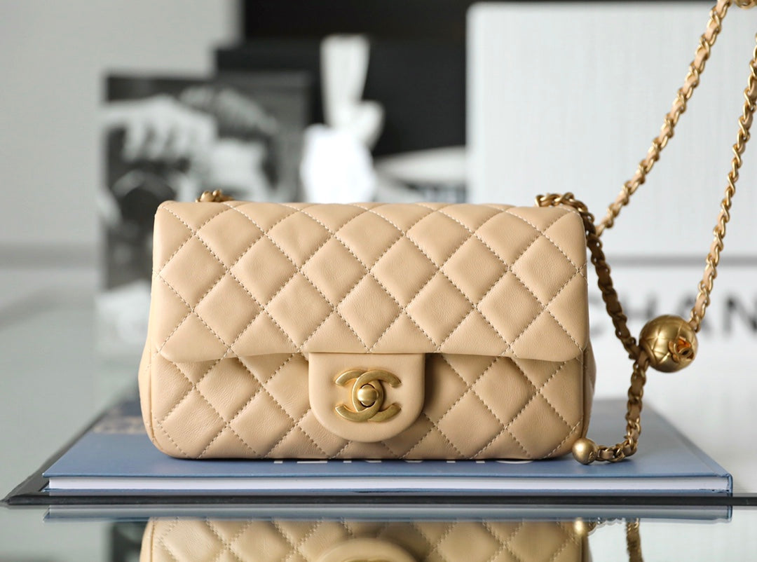 Chanel classic flap mini with golden ball