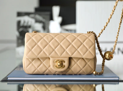 Chanel classic flap mini with golden ball