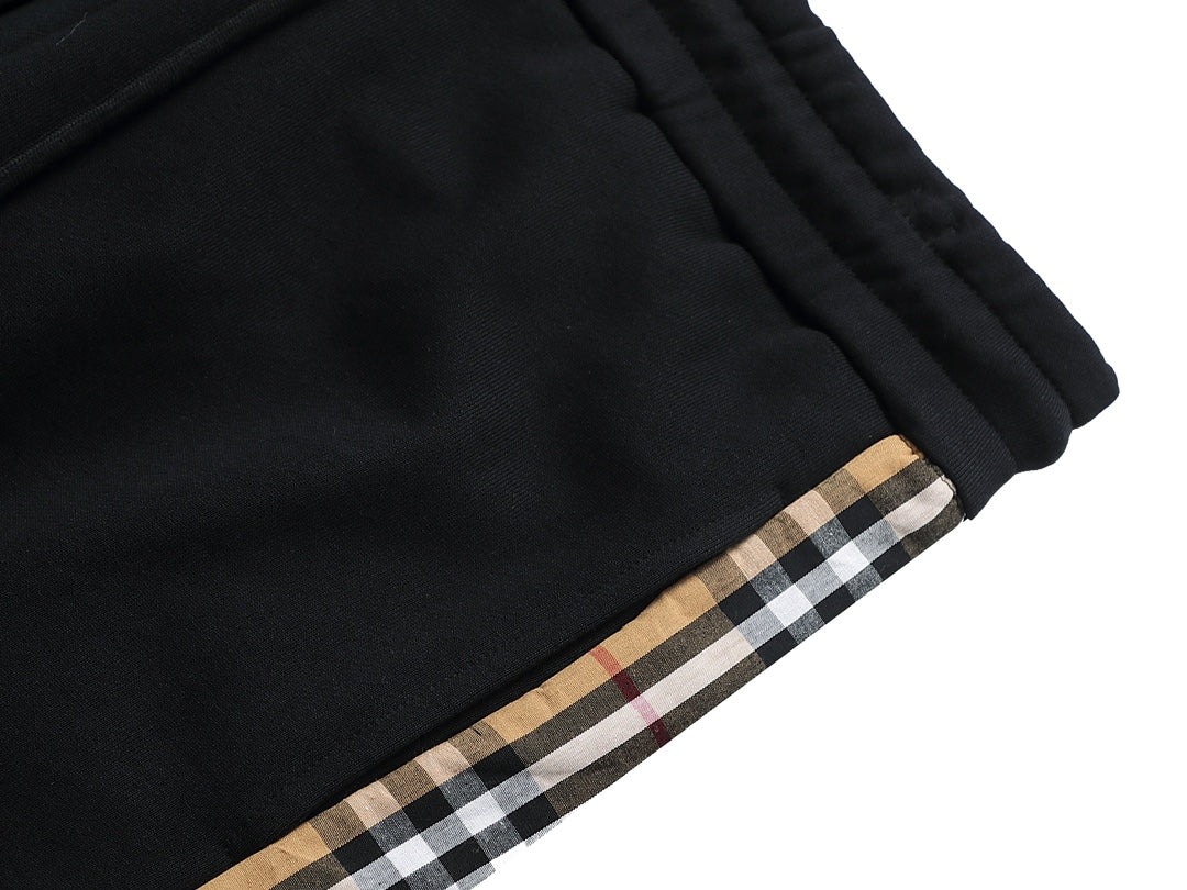 【Burberry 公式 旗艦店】24FW ラミネートロゴパンツ