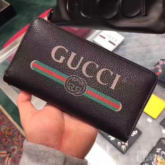 GUCCIグッチ新しいブラックレザーのロゴ印刷大容量マルチカード長財布496319 0GCAT 8163