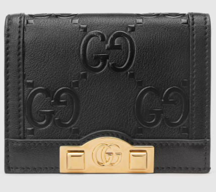 SALE★GG Deboss柄【送込GUCCI】2折中財布★黒白革/金デコ-BUYMA