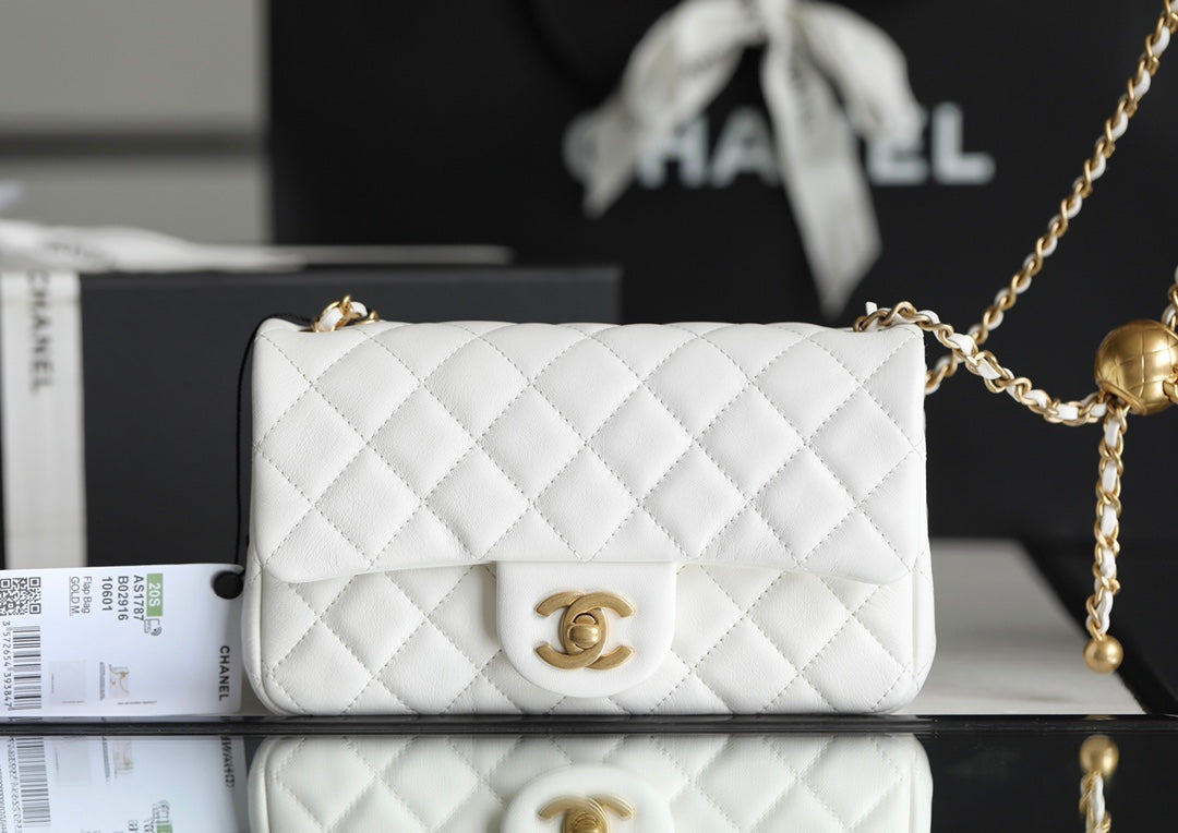 Chanel classic flap mini with golden ball