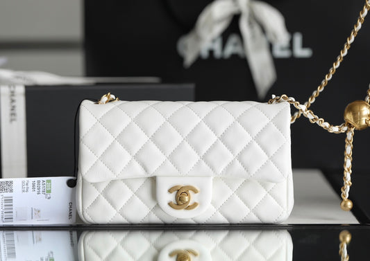 Chanel classic flap mini with golden ball