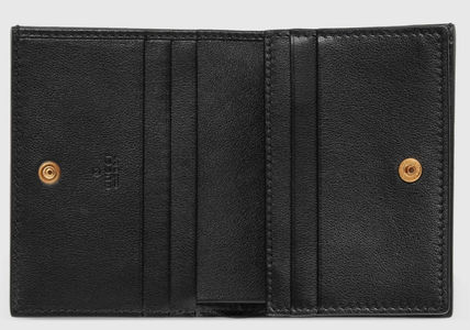 SALE★GG Deboss柄【送込GUCCI】2折中財布★黒白革/金デコ-BUYMA