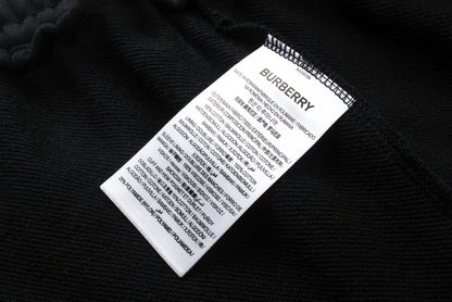 【Burberry 公式 旗艦店】24FW ラミネートロゴパンツ