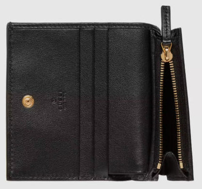 SALE★GG Deboss柄【送込GUCCI】2折中財布★黒白革/金デコ-BUYMA