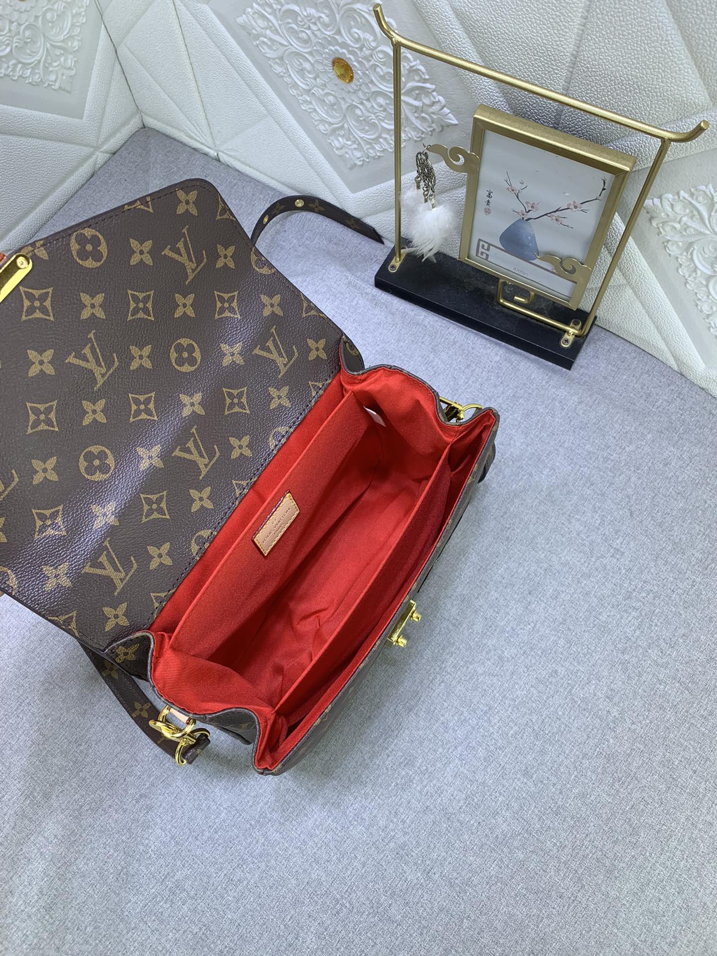LouisVuitton モノグラムキャンバスボディにグレイン牛革のレオパードパッチ付き M47203 M40780