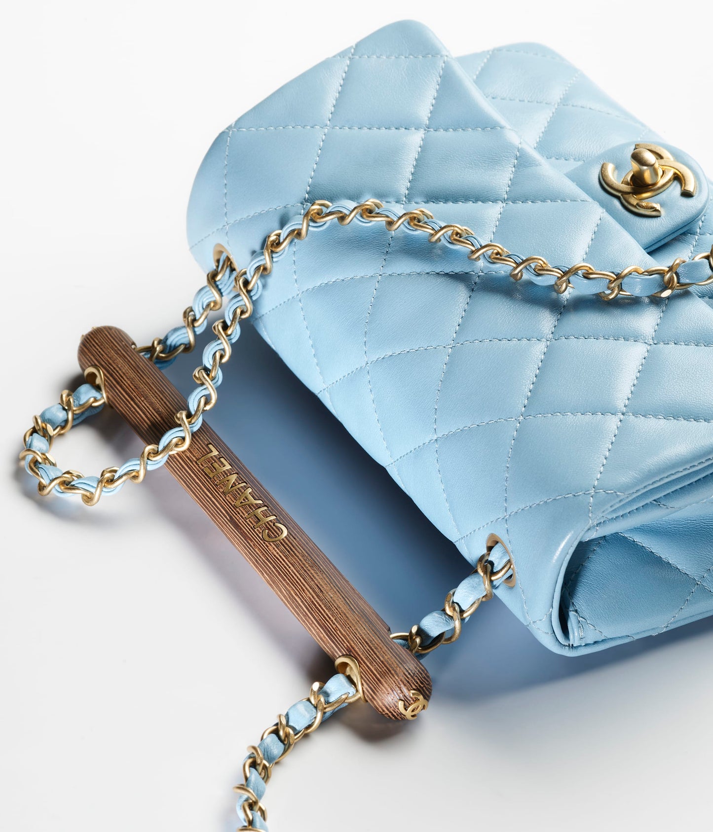 スモール トップハンドル フラップ バッグ