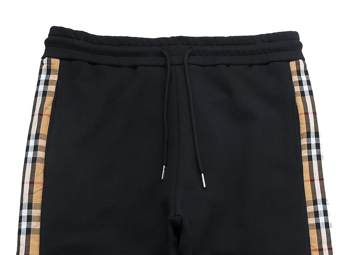 【Burberry 公式 旗艦店】24FW ラミネートロゴパンツ