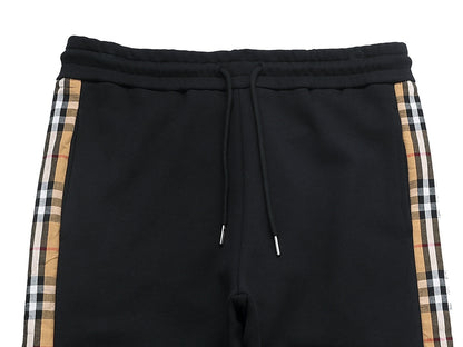 【Burberry 公式 旗艦店】24FW ラミネートロゴパンツ
