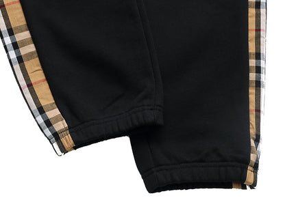 【Burberry 公式 旗艦店】24FW ラミネートロゴパンツ