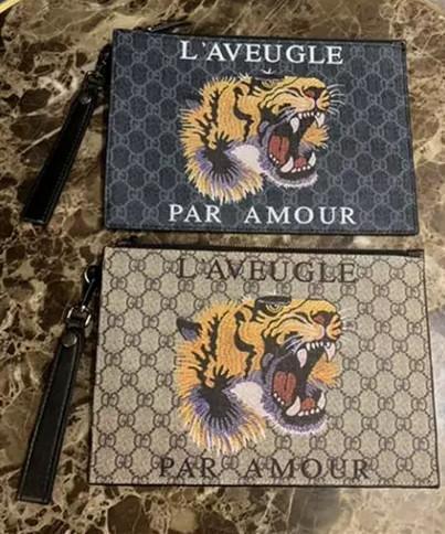 GGグッチタイガーヘッド男性クラッチ財布