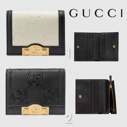 SALE★GG Deboss柄【送込GUCCI】2折中財布★黒白革/金デコ-BUYMA