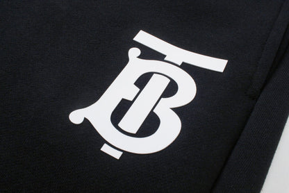 【Burberry 公式 旗艦店】24FW ラミネートロゴパンツ