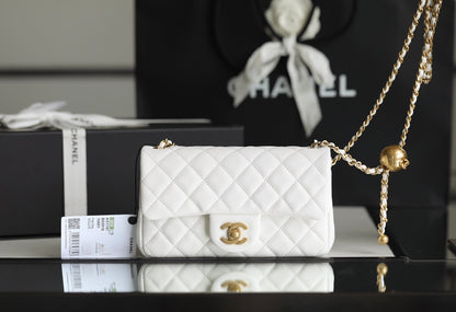 Chanel classic flap mini with golden ball