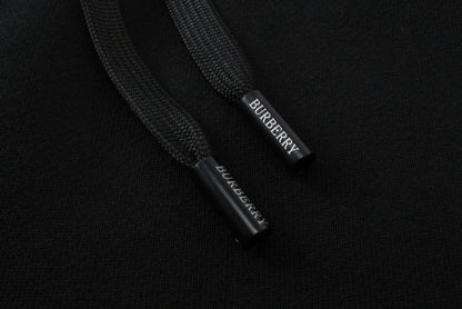 【Burberry 公式 旗艦店】24FW ラミネートロゴパンツ