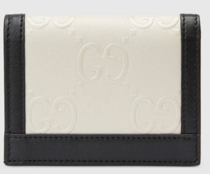 SALE★GG Deboss柄【送込GUCCI】2折中財布★黒白革/金デコ-BUYMA