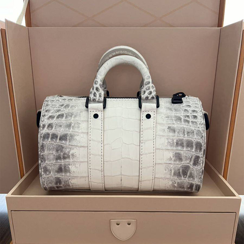 ルイヴィトン サハラキーポルXS